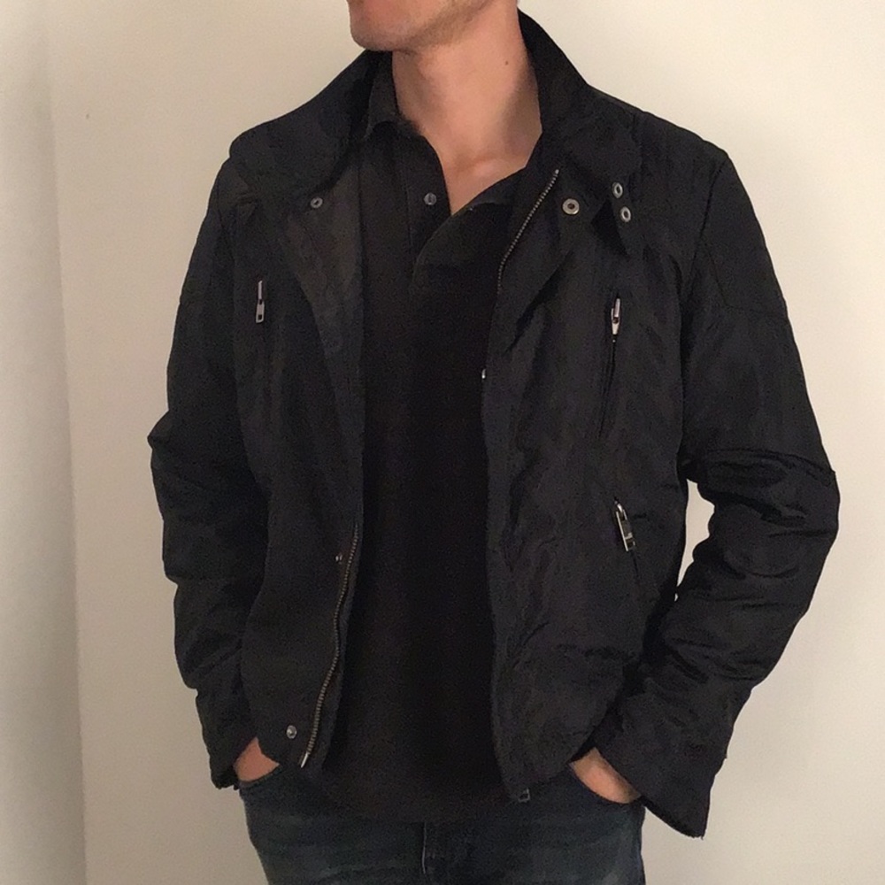Love Moschino men moto jacket. Nylon material. Quilted lining. Size 52 European.